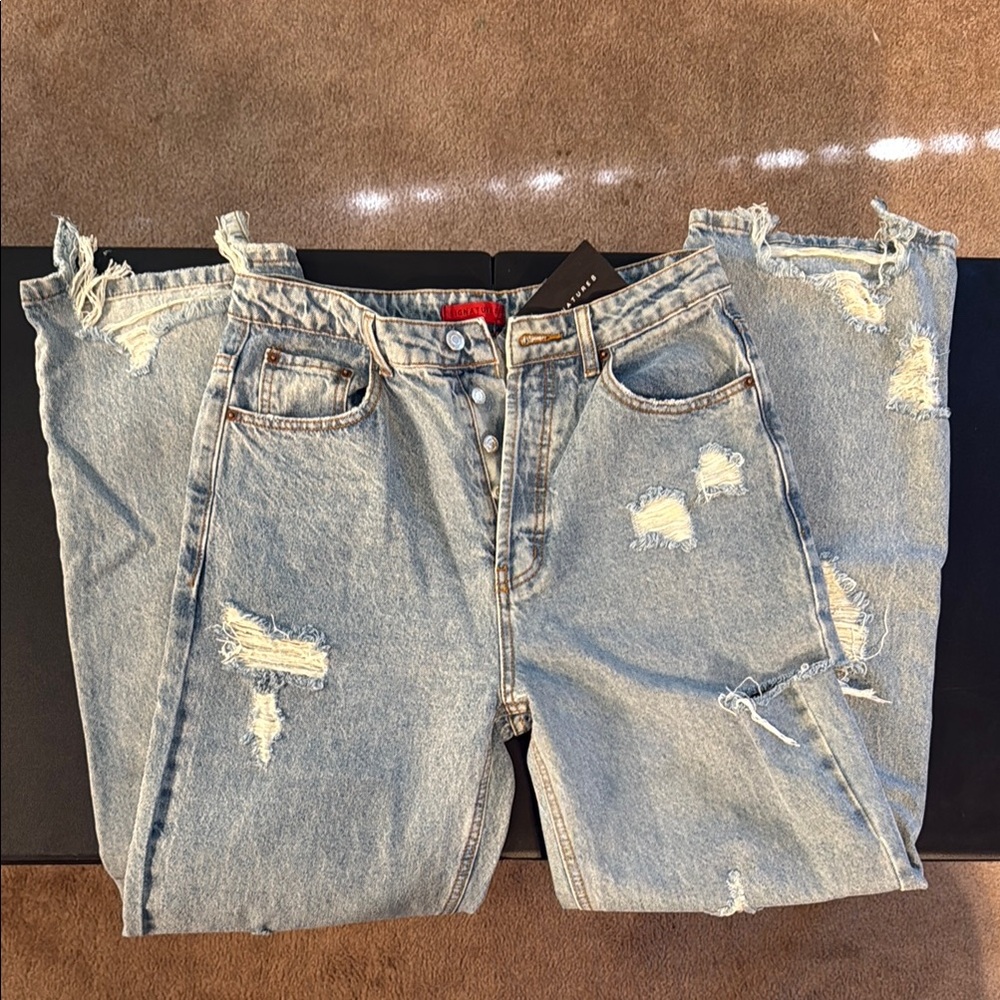 NWT women’s Distressed Light Blue Jeans by signature 8